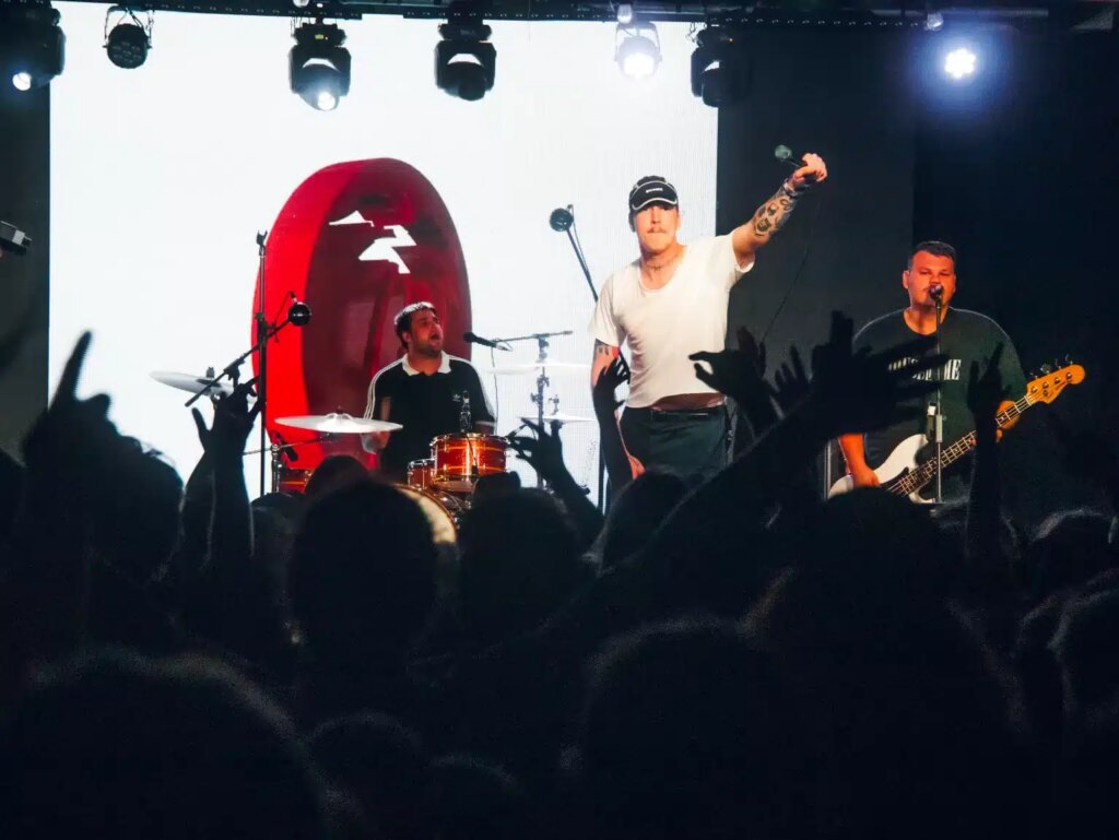 Trophy Eyes on stage with the crowd looking ahead at them