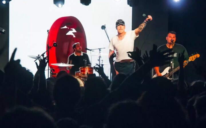 Trophy Eyes on stage with the crowd looking ahead at them