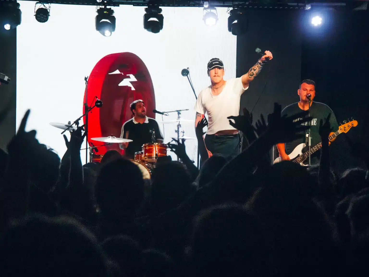 Trophy Eyes on stage with the crowd looking ahead at them