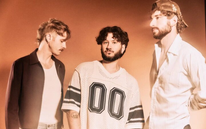 The Band CAMINO pose in a moody promotional shot ahead of their NeverAlways world tour and latest single release 12:34.