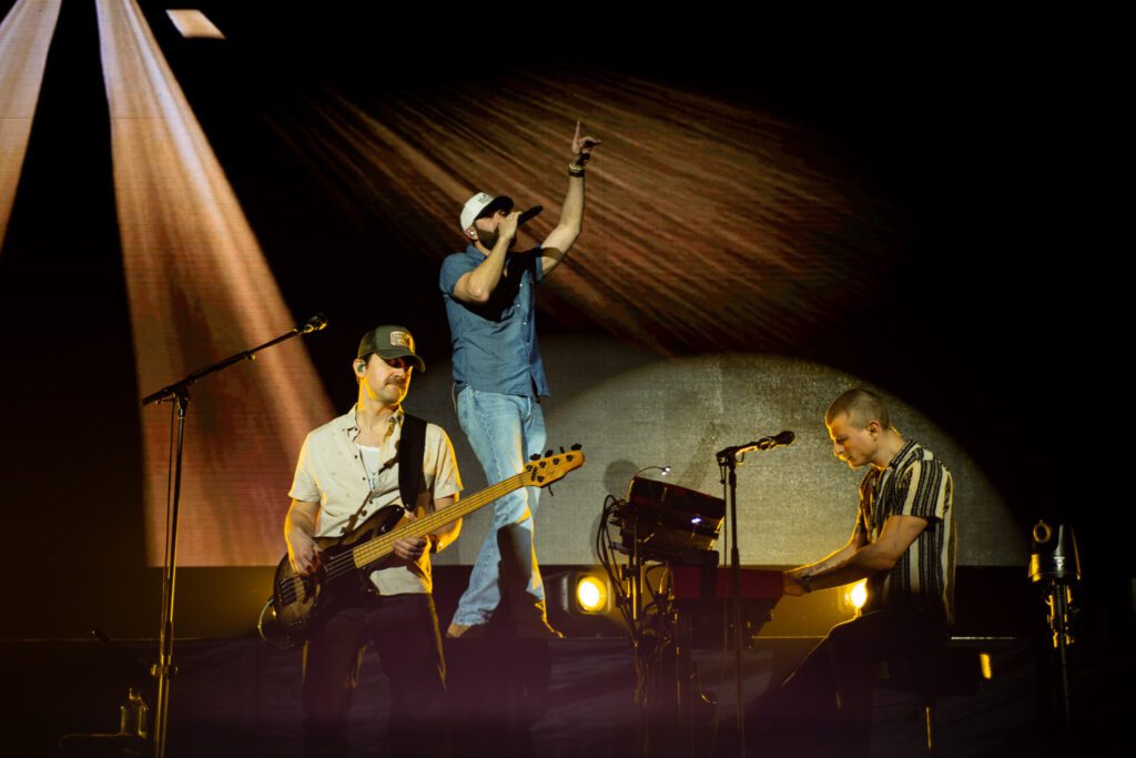 Jordan Davis on stage in Auckland, New Zealand with his band