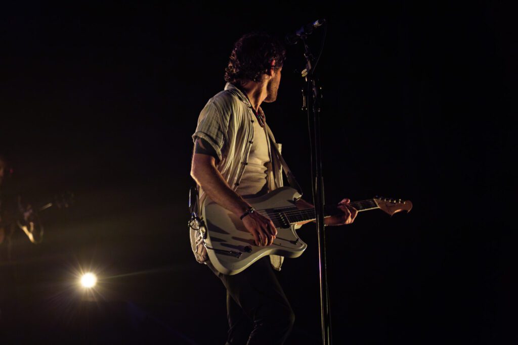 Tucker Wetmore and Jordan Davis guitarist on tour in New Zealand