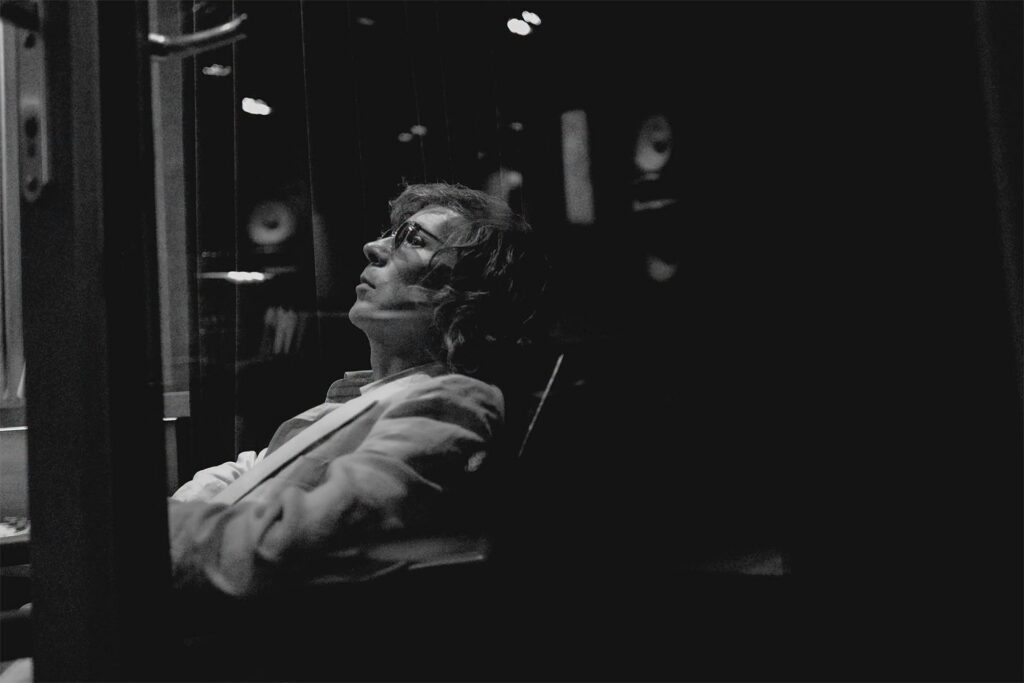 Artist Beck in the studio in black and white