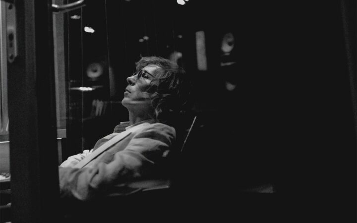 Artist Beck in the studio in black and white
